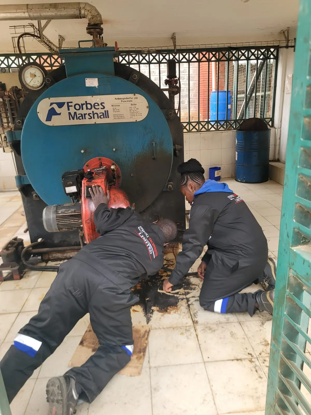 Burner repair teamwork